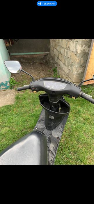 Скутер honda dio