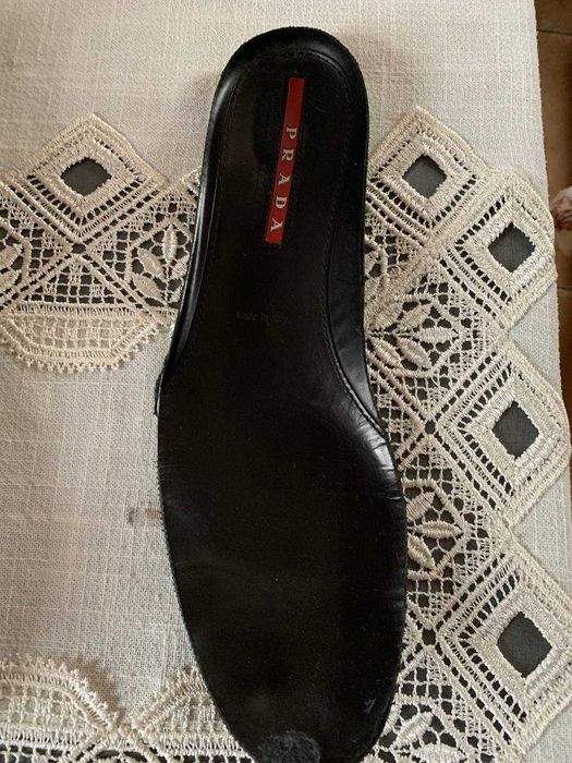 Шкіряні кросівки Prada