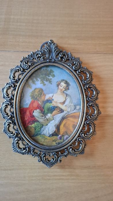 Portrety w ramkach z mosiądzu