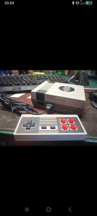 Mini Consola  com 1 comando e muitos jogos antigos