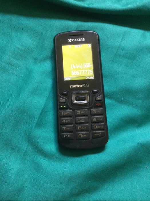 Мобильный телефон рабочий КУОСЕRA metro