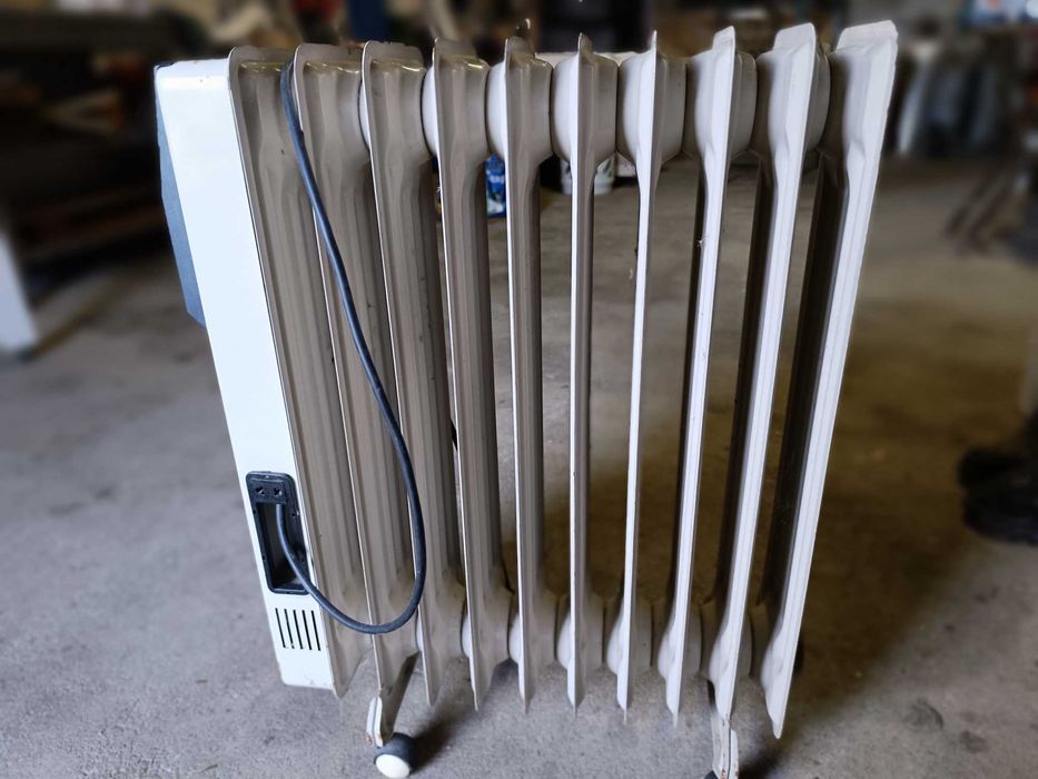 Aquecedor eletrico Singer 2000w com 9 elementos