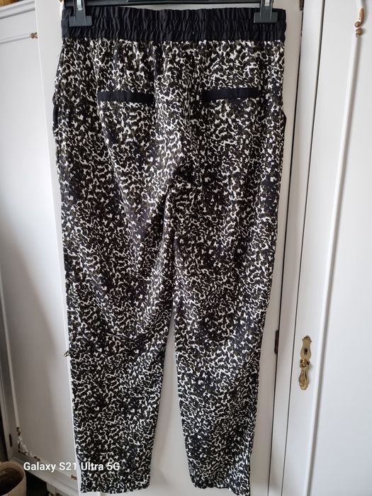 Calças acetinadas animal print