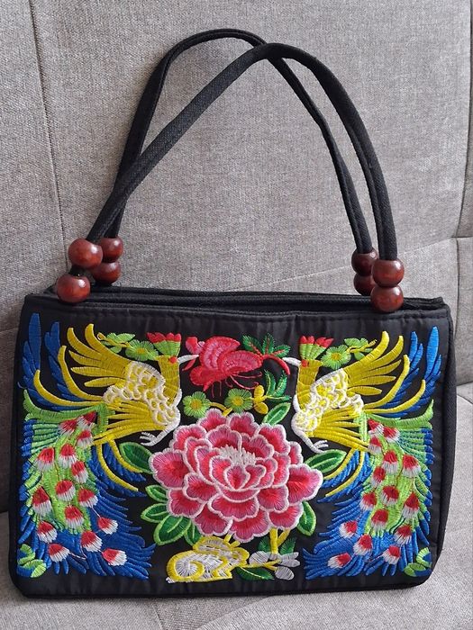 Nowa,haftowana torebka tekstylna.