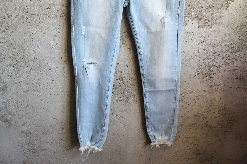 M'SARA jeansowe spodnie skinny r.44/46 mega dziury, strzępienia