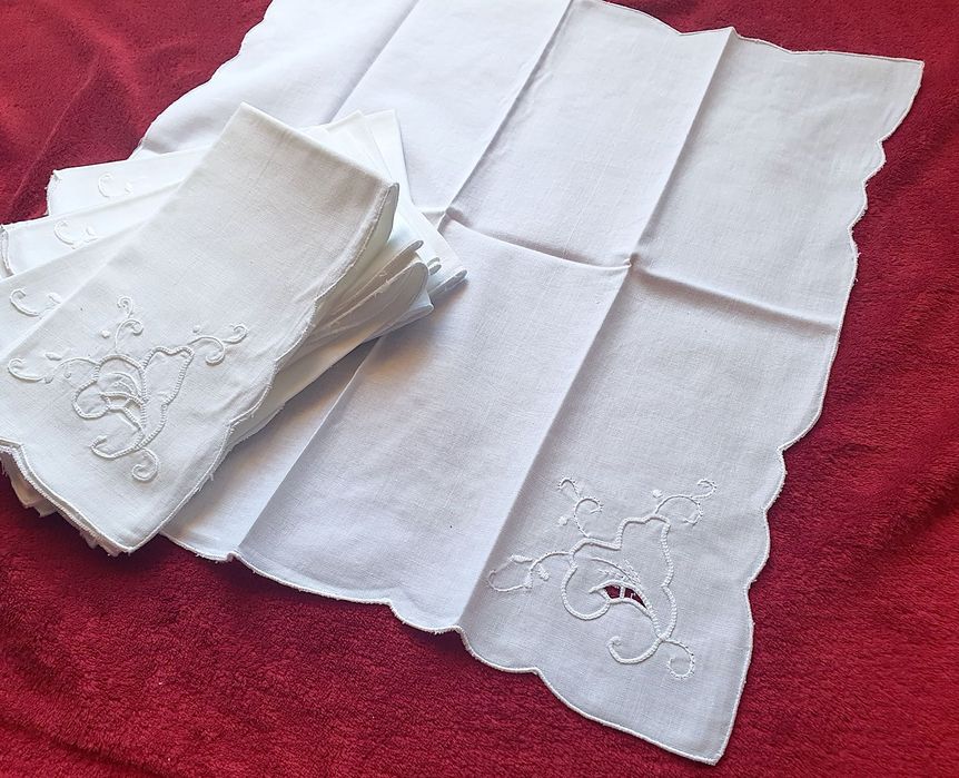 Twelve hand-embroidered white cotton napkins