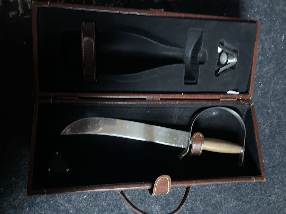 Sabre para abrir garrafas
