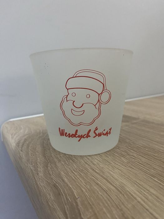 Szklany świecznik z Mikołajem