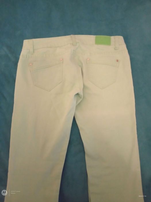 Sprzedam jasne zielone damskie spodnie rozmiar wg metki XL