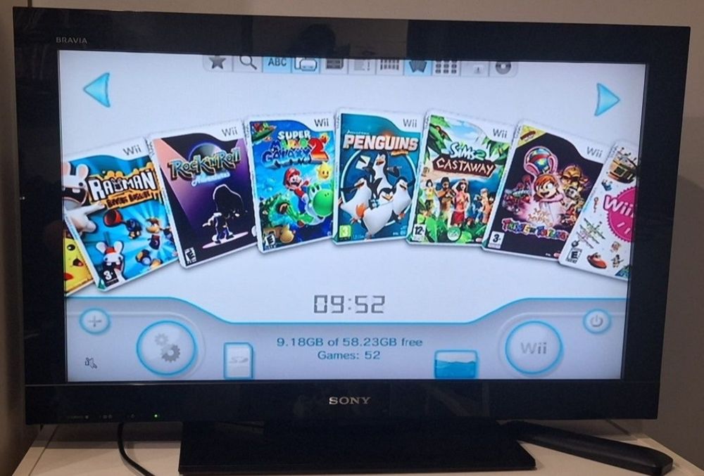 Nintendo Wii com 52 jogos digitais.