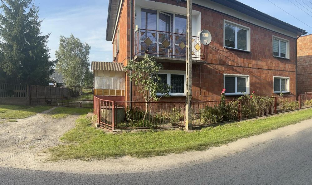 Dom z budynkami gospodarczymi i ziemią rolną