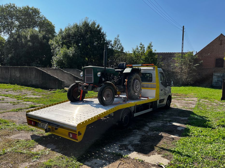 Pomoc drogowa, przewóz samochodów, materiałów budowlanych etc.