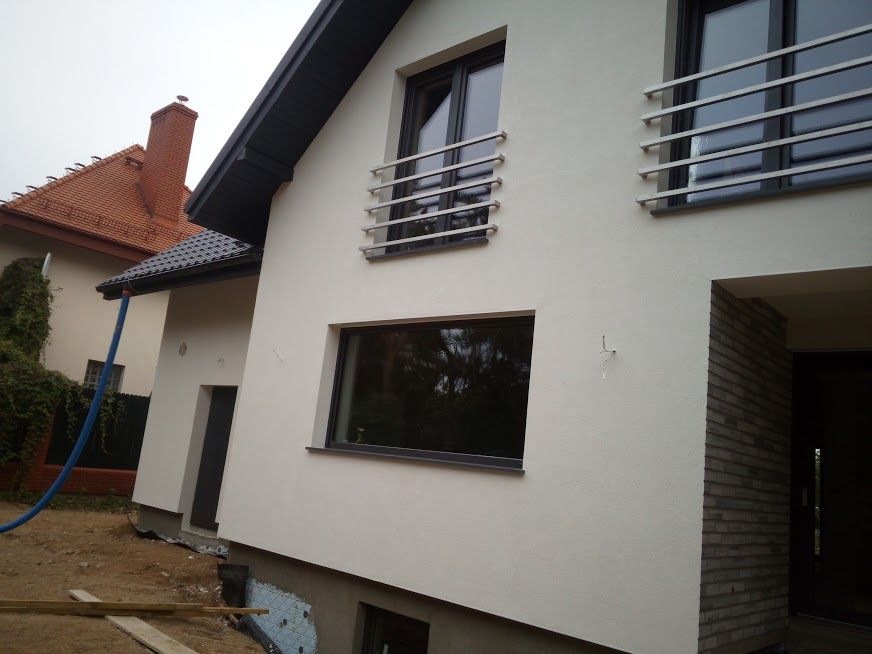 Elewacje docieplenia domów wykończenia poddasza