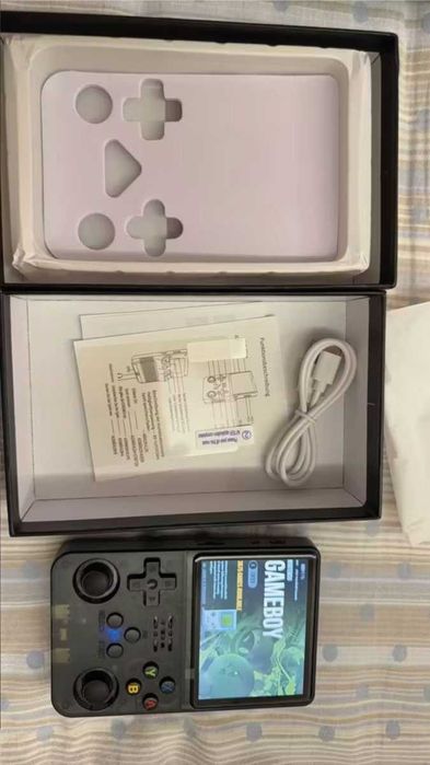 Przenośna Konsola Retro R36S – 15000 gier, 64GB, idealna na prezent