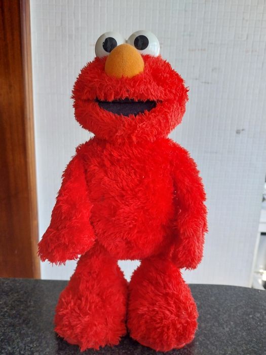 Boneco de peluche a pilhas Elmo