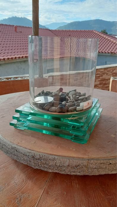 Peça decorativa com chama a beatanol