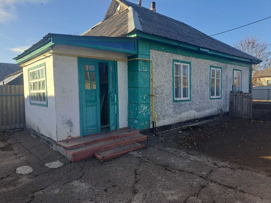 Продам 1/2 будинка