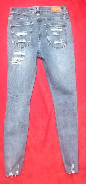 Dżinsy damskie niebieskie rozdarcia Re-dress
