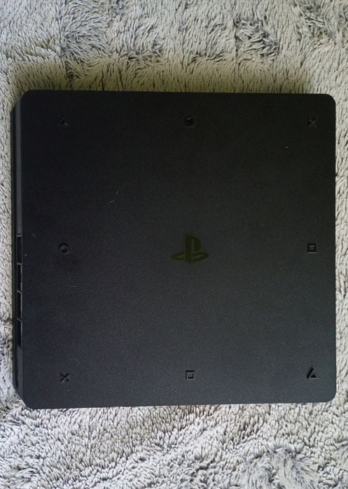 PlayStation 4 Slim 1TB + pad + 3 gry FIFA 23, Cyberpunk 2077, NBA 2K25