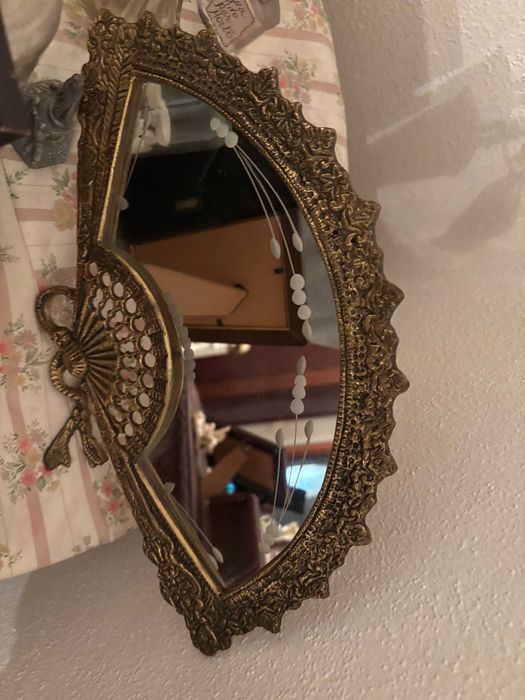 espelho em forma de leque