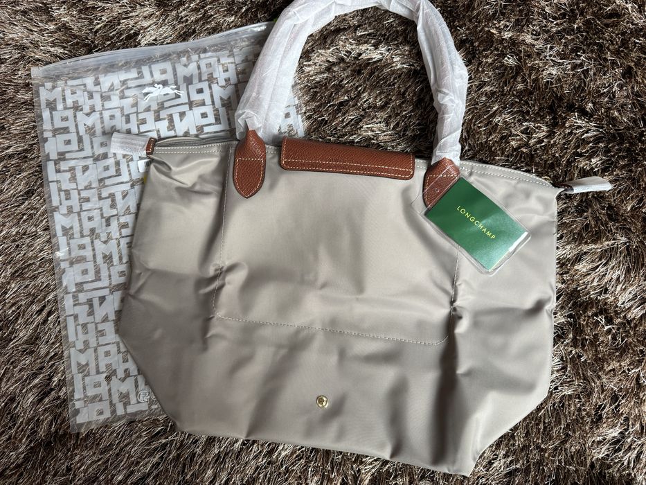 Longchamp beje le pliage