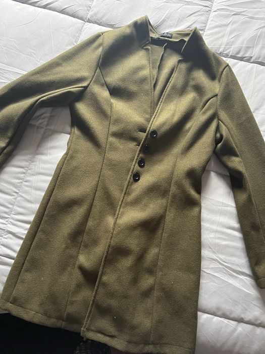 casaco comprido verde