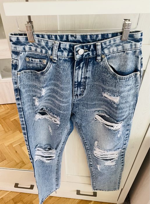 Nowe spodnie jeansowe L przetarcia mommy