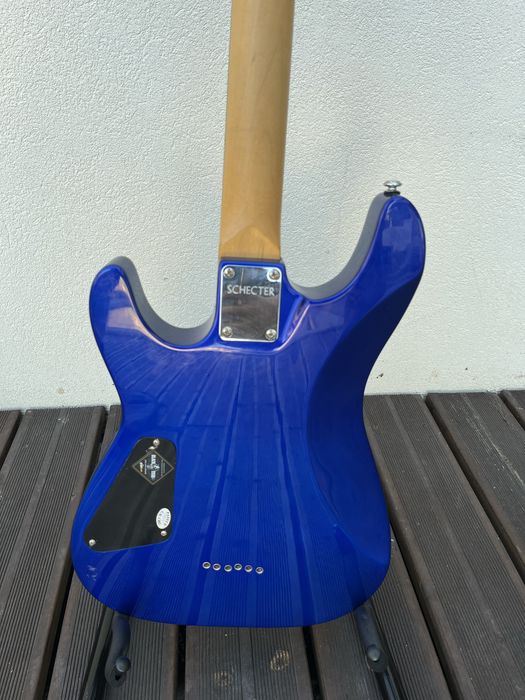 Guitarra Schecter Diamond Series Omen-6 Electric Blue + Amplificador Stagg 10AA + Cabo + Suporte + Saco de Transporte