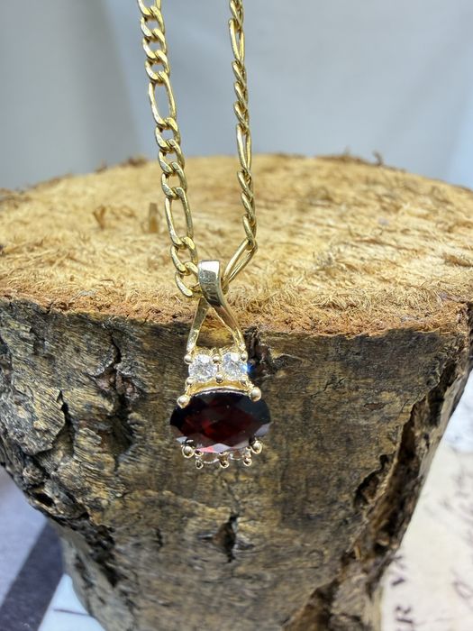 Золотий набір з гранатами