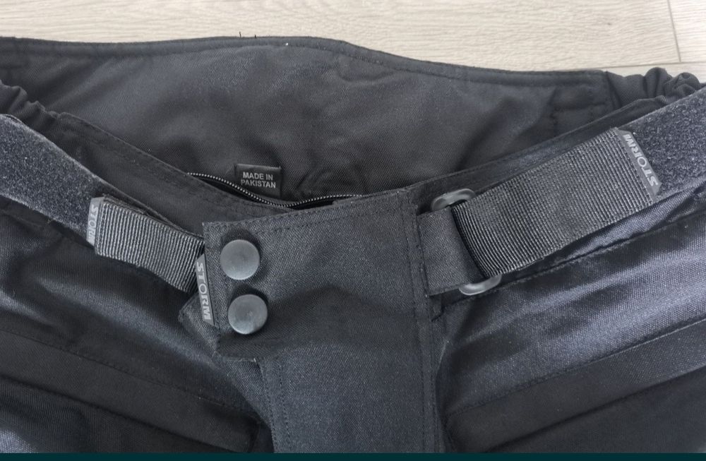 Calças para motociclista impermeáveis