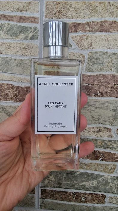 Angel Schlesser  White Flowers