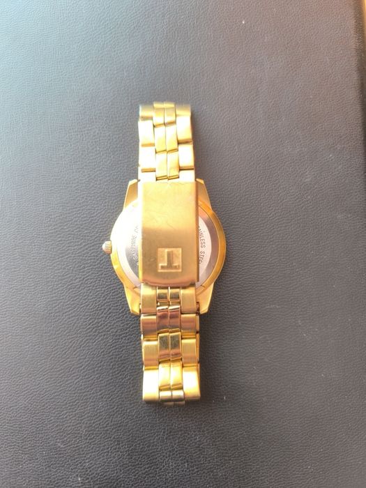 Męski zegarek pozłacany Tissot