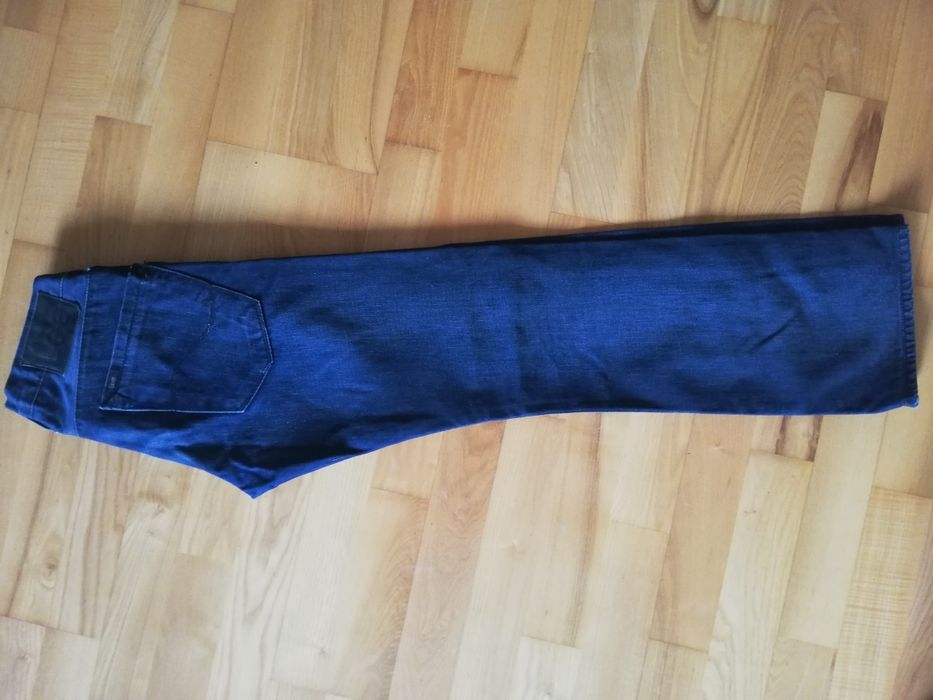 Męskie spodnie jeansowe Lee, W28