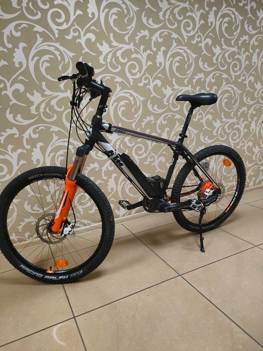 Rower elektryczny KTM e Race biało czarny pomarańczowy Bytom • OLX.pl