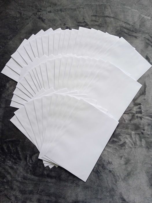 Biała koperta 185x250 mm z paskiem HK; 50 sztuk
