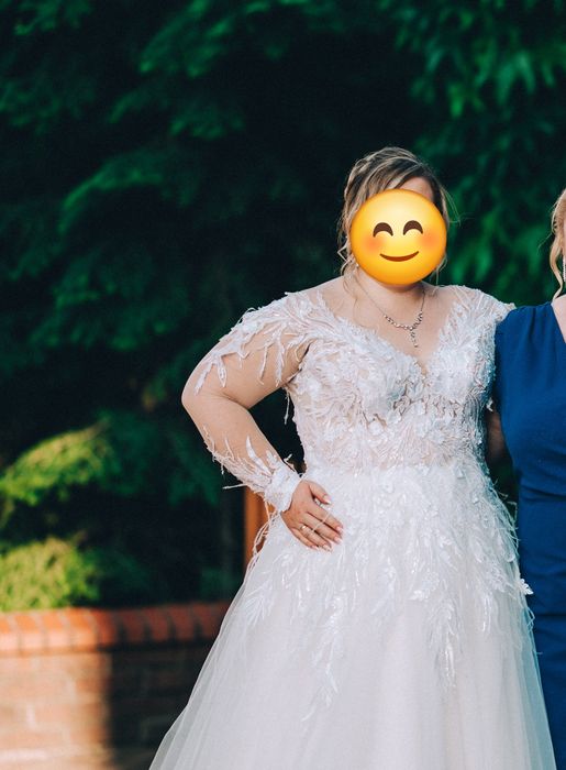 Suknia ślubna długi rękaw piórka