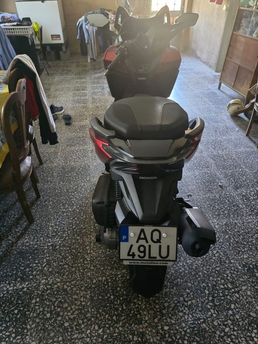 Scooter como nova