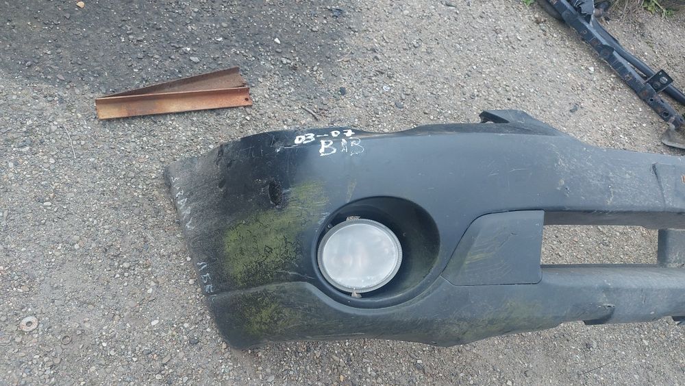 Бампер передній 06- Subaru Legacy Outback B13 2003-2009 57704AG230