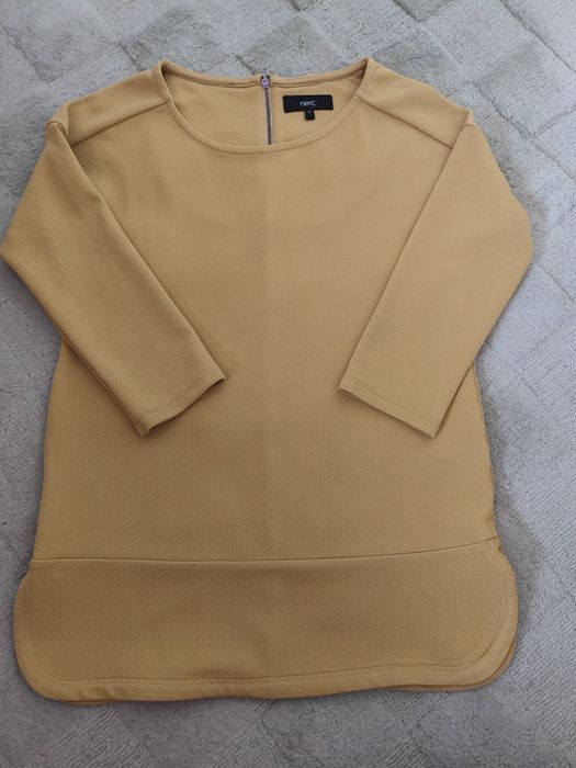 Bluzka w kolorze musztardowym w rozmiarze 6 z nexta.