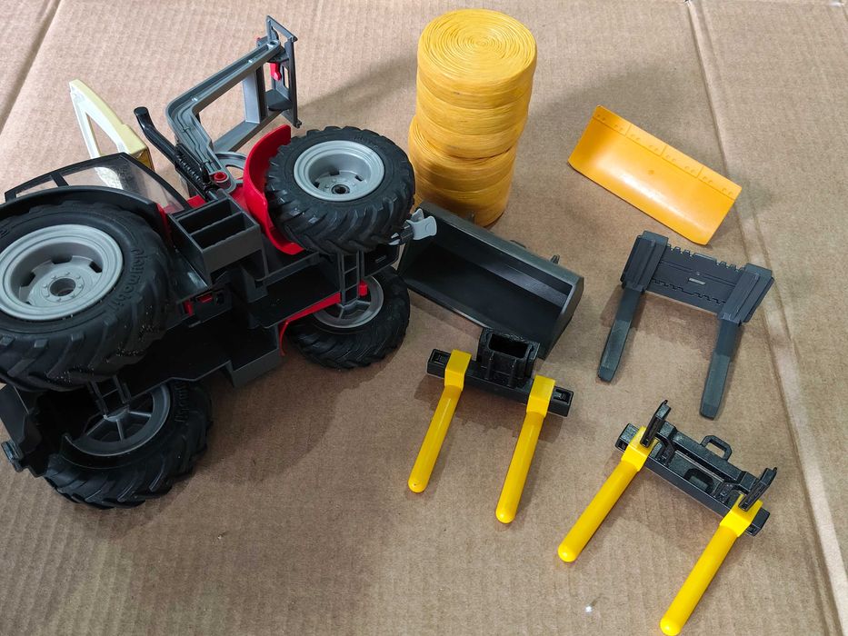 Vendo trator com pá de brincar