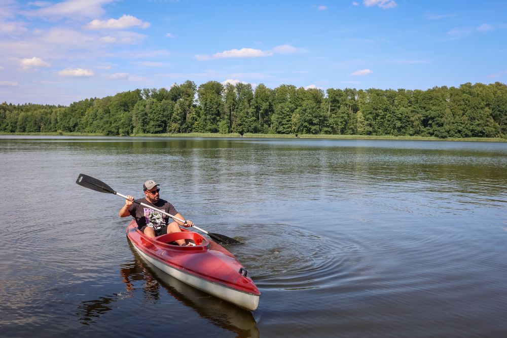 Domek nad jeziorem z jacuzzi sauna na Mazurach  noclegi domki łódka