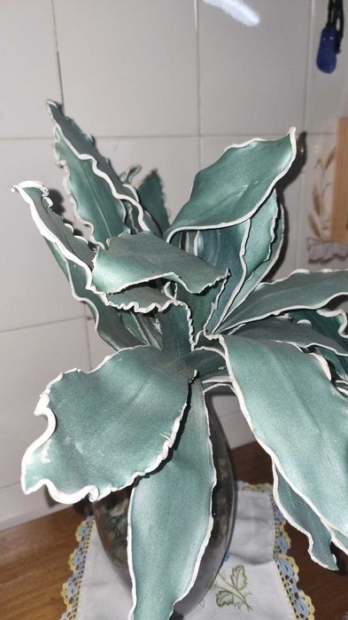 Flor decorativa verde azulada