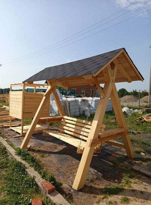 Альтанки гойдалки тераси дитячі майданчики вироби з дерева