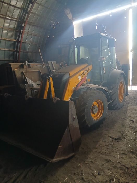 Экскаватор погрузчик  TEREX 860