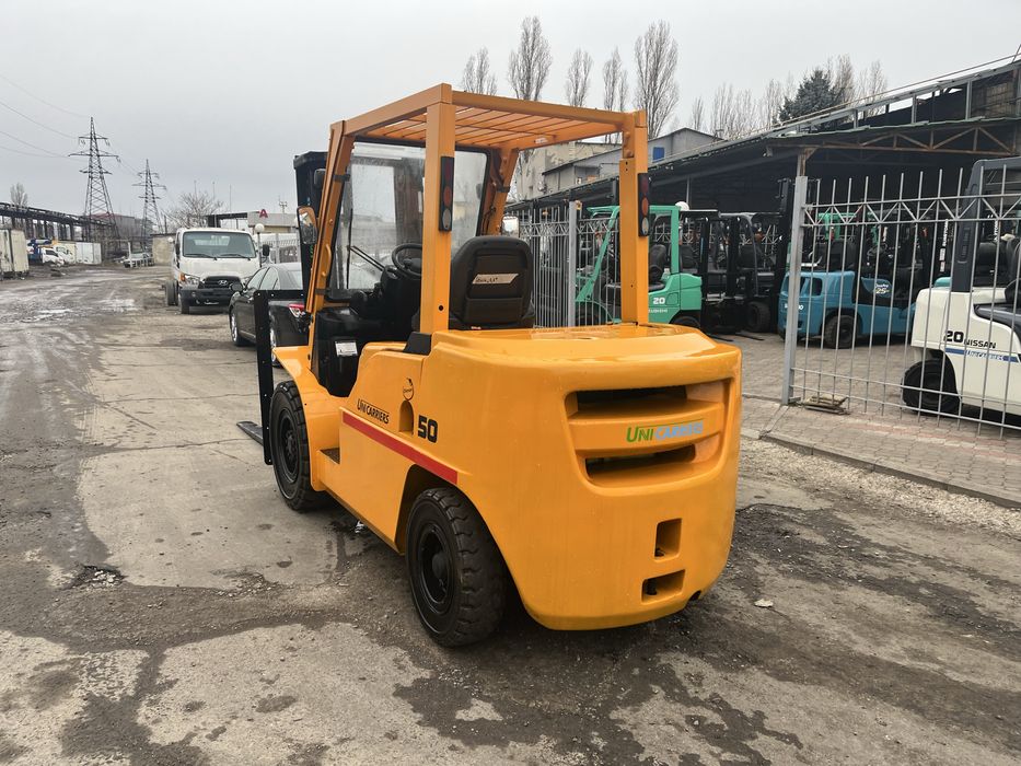 Вилковий навантажувач Nissan-unic, дизель, 5 тонн, вилочный погрузчик