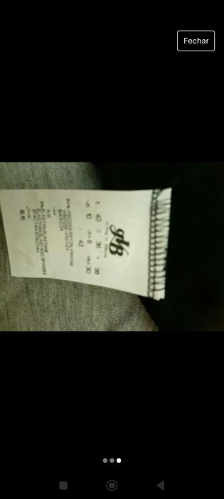 Camisola preta em algodão, decote em barco.