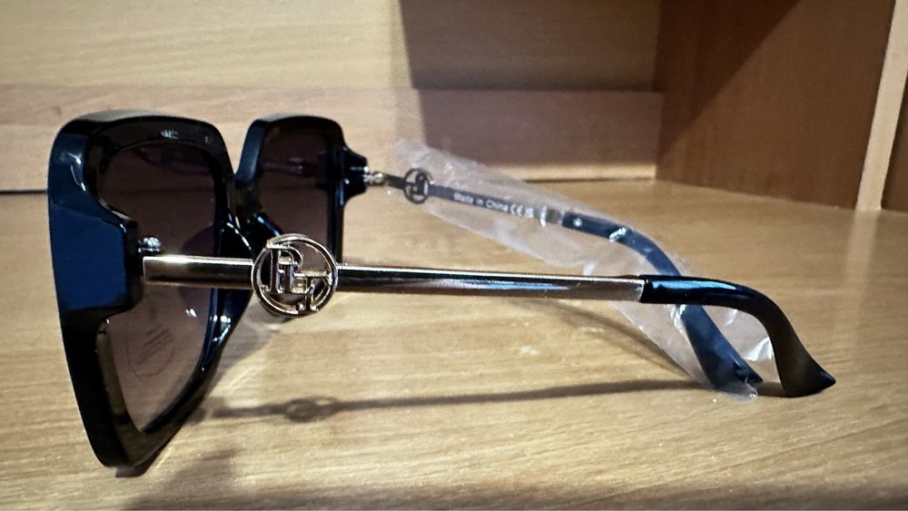 Жіночі сонцезахисні окуляри