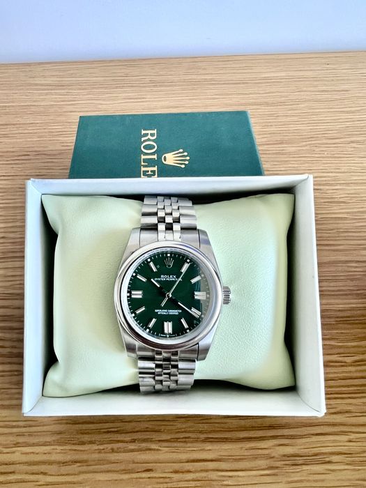 Rolex Oyster Perpetual verde.