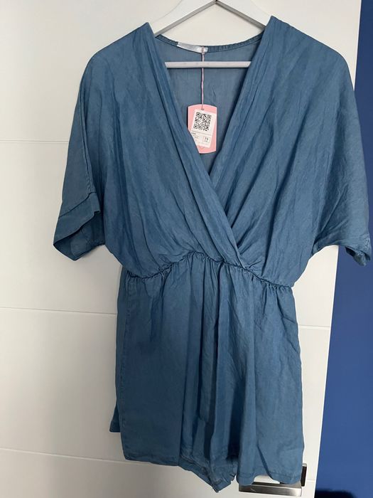 Kombinezon z rękawem, krótki - nowy  :)