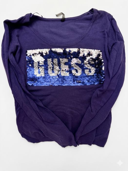 жіночий джемпер GUESS — ідеальний варіант для тих, хто полюбляє поєднувати комфорт зі стилем